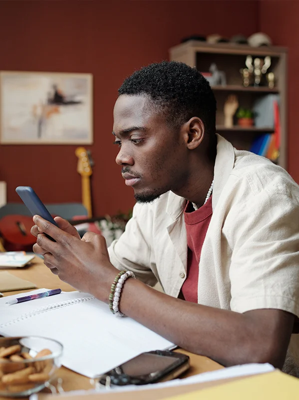 Student carefully checking the requirements for a no teletrack payday loan