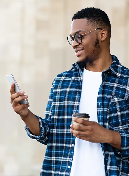 Young man checking a payday loan approval email in Missouri