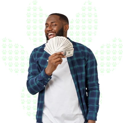 Young man cash and smiling, on a white background with a paw print pattern.