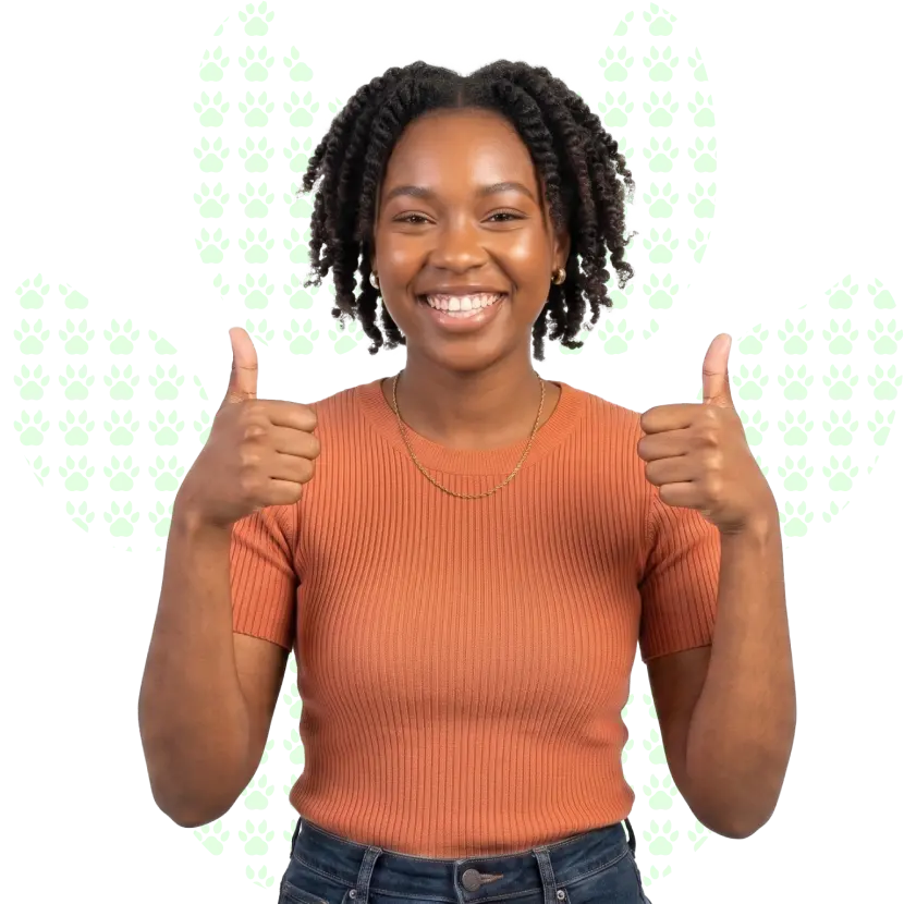 A happy young woman standing and showing double thumbs-up